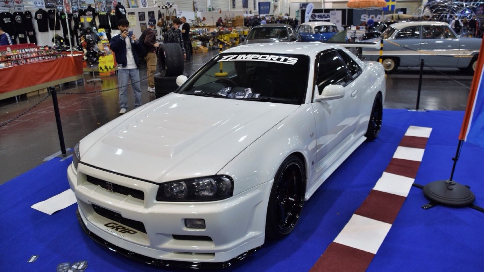 White 2001 Nissan Skyline GT-R (R34) on display, front three-quarter view