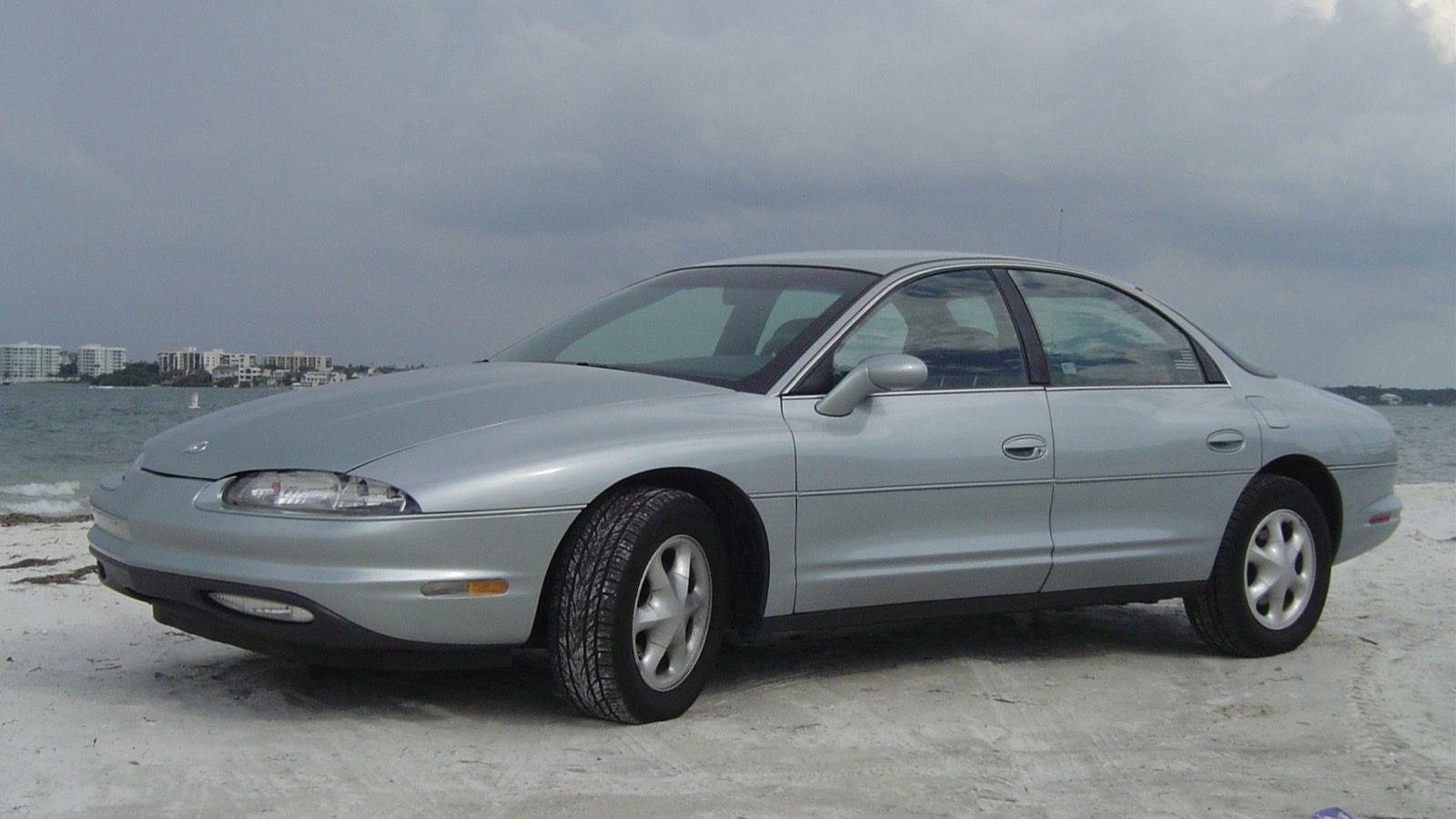 Silver 1996 Oldsmobile Aurora sedan, front three-quarter view