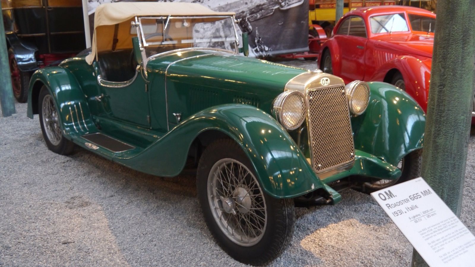 Green OM 665 MM roadster on museum display, front three-quarter view