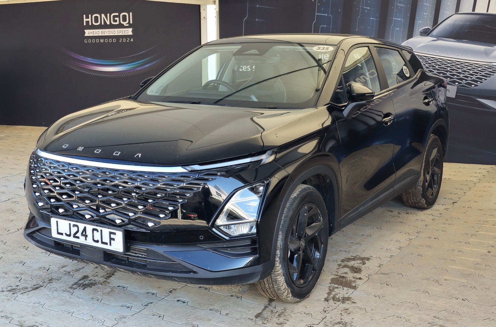 Black Omoda 5, front three-quarter view