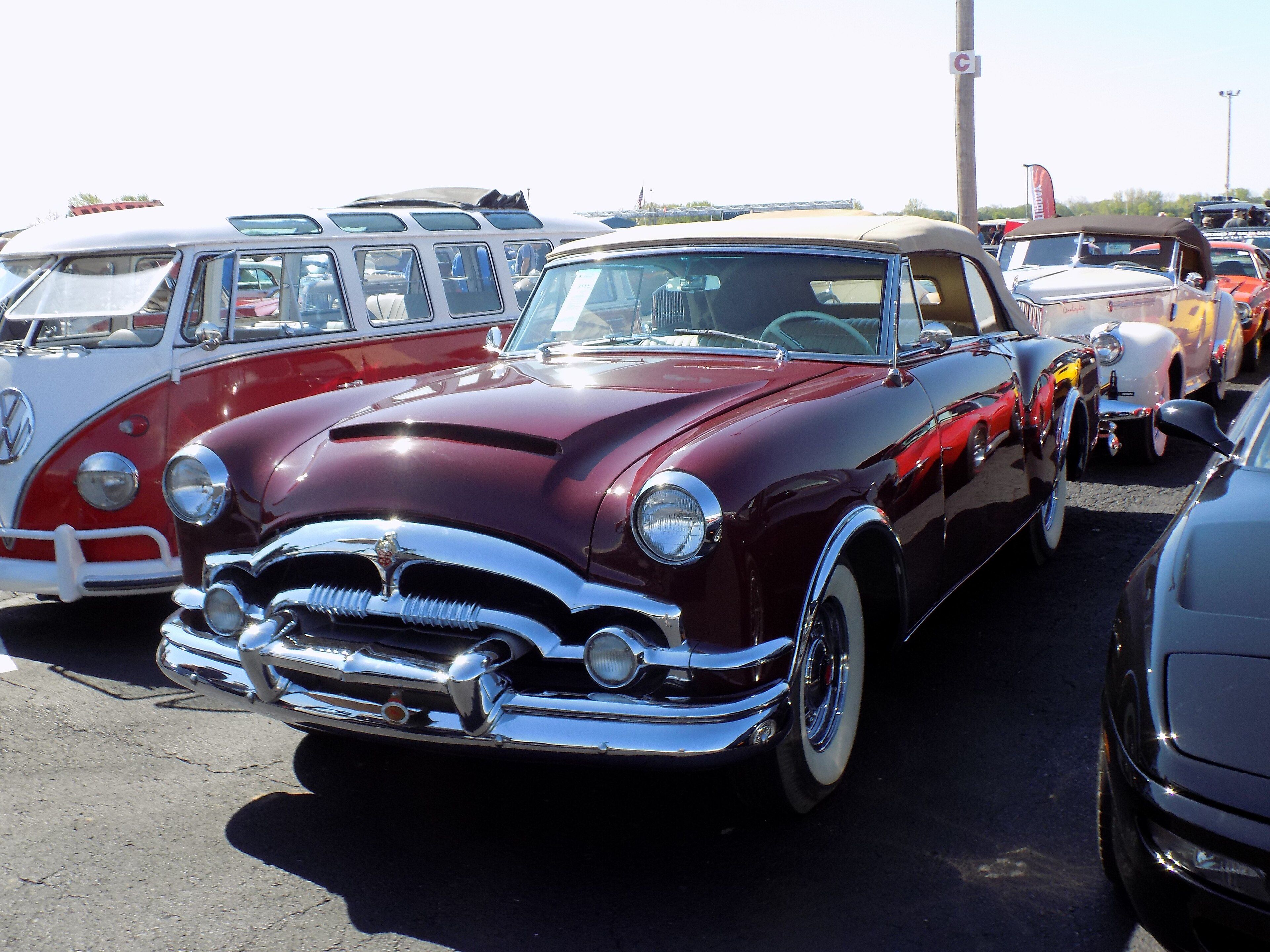 Maroon 1953 Packard Caribbean convertible, front three-quarter view
