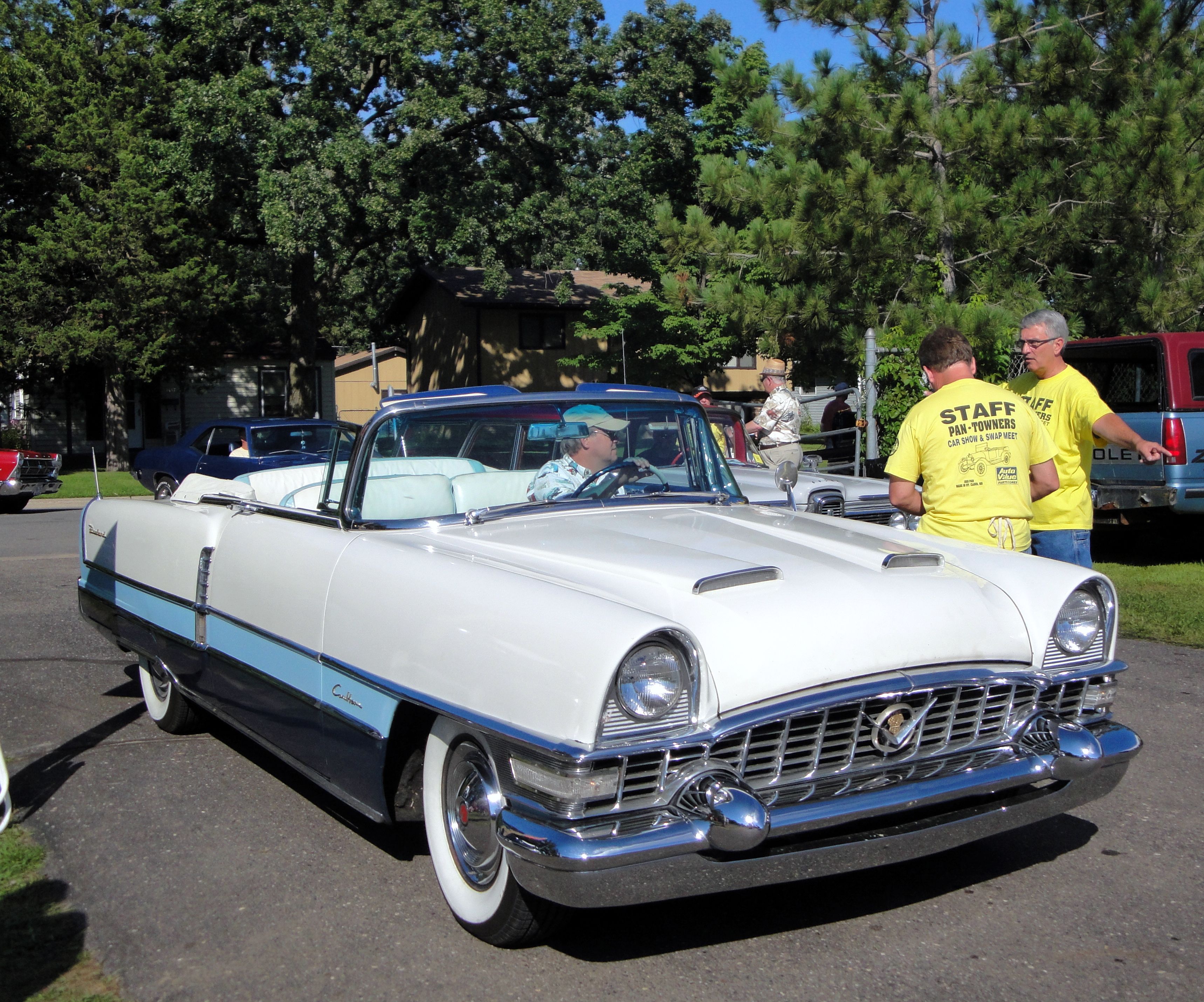 White and blue 1956 Packard Caribbean convertible, front three-quarter view