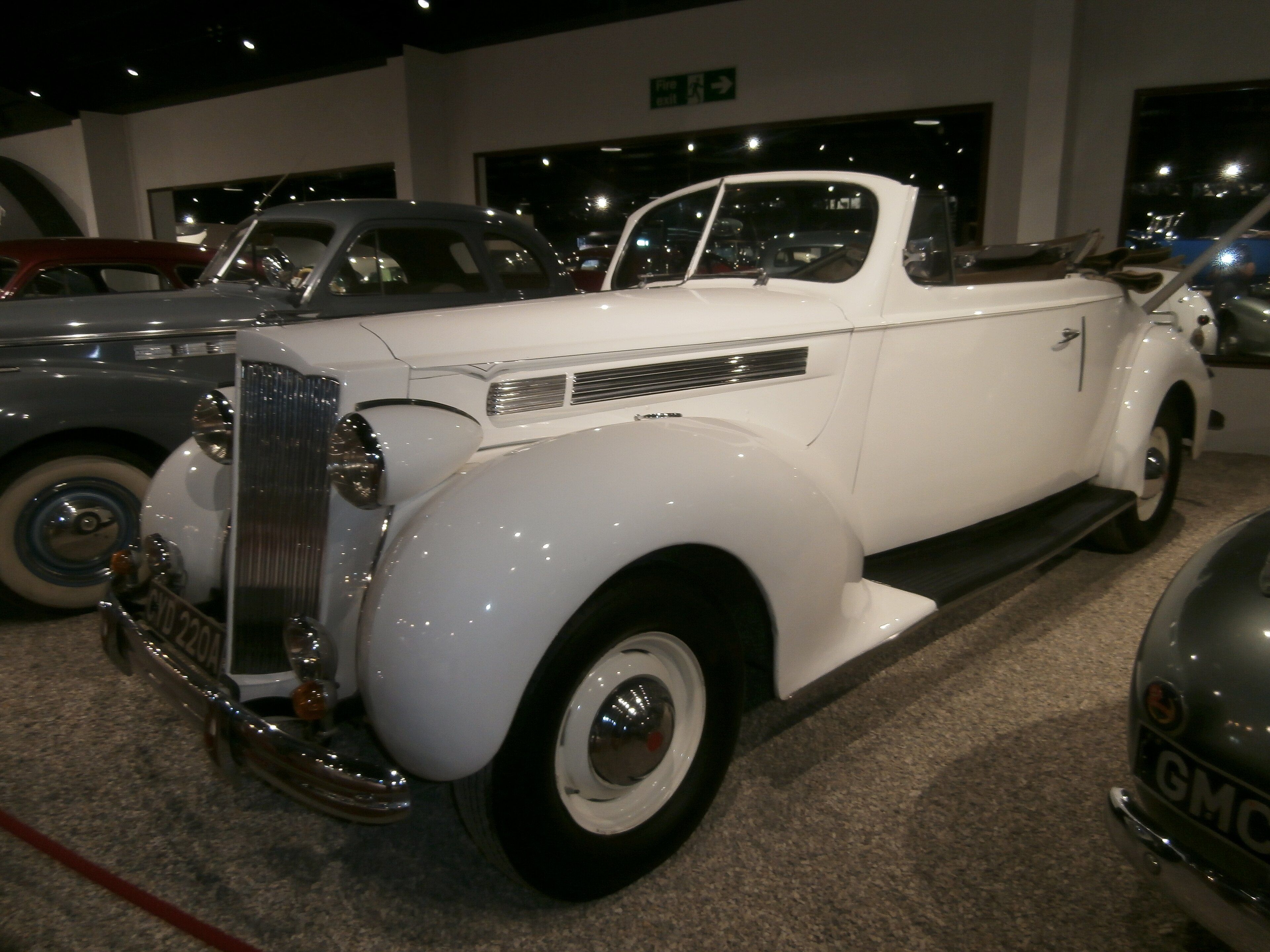 White 1939 Packard One-Twenty convertible, front three-quarter view