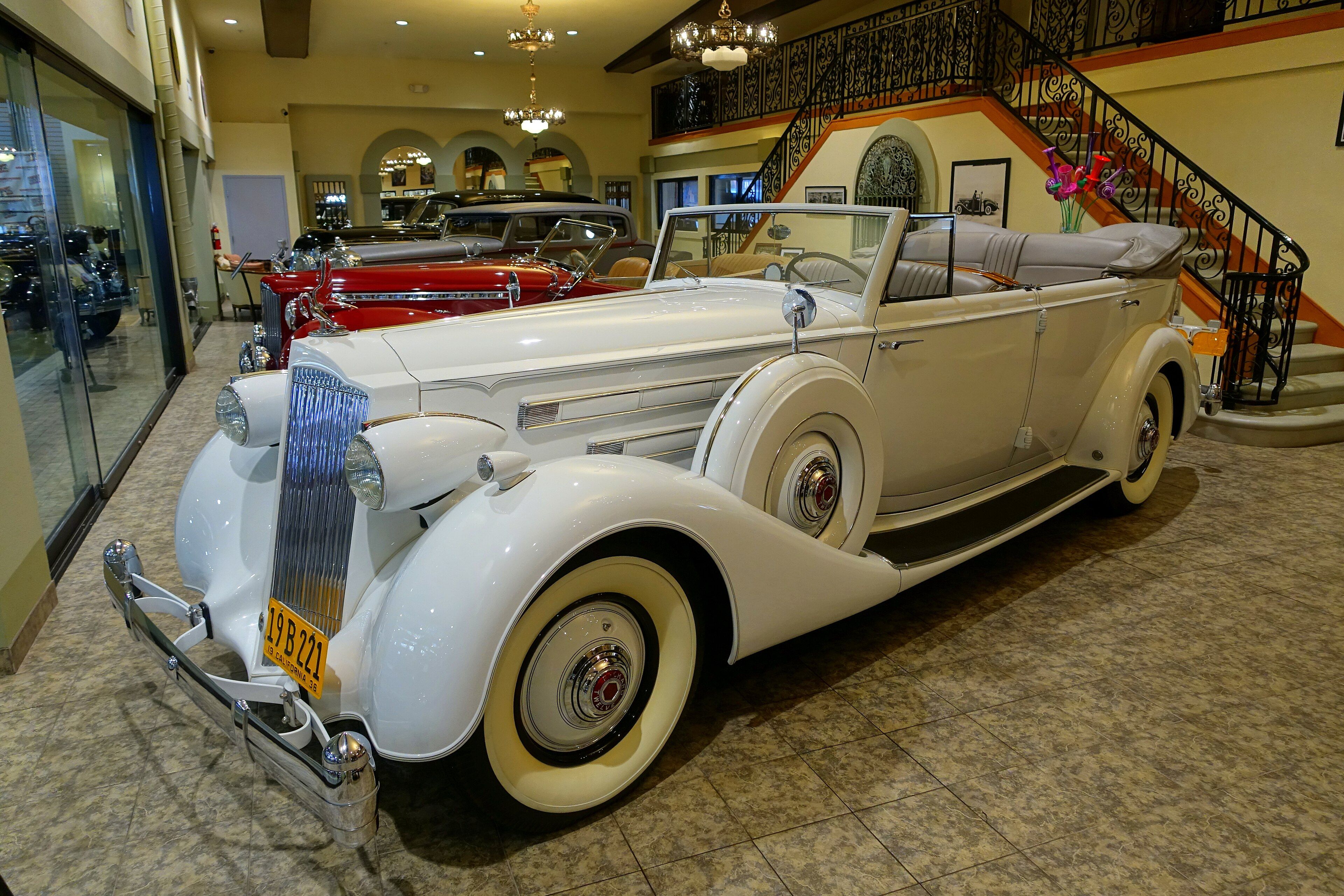 White 1936 Packard Twelve Convertible Sedan, front three-quarter view