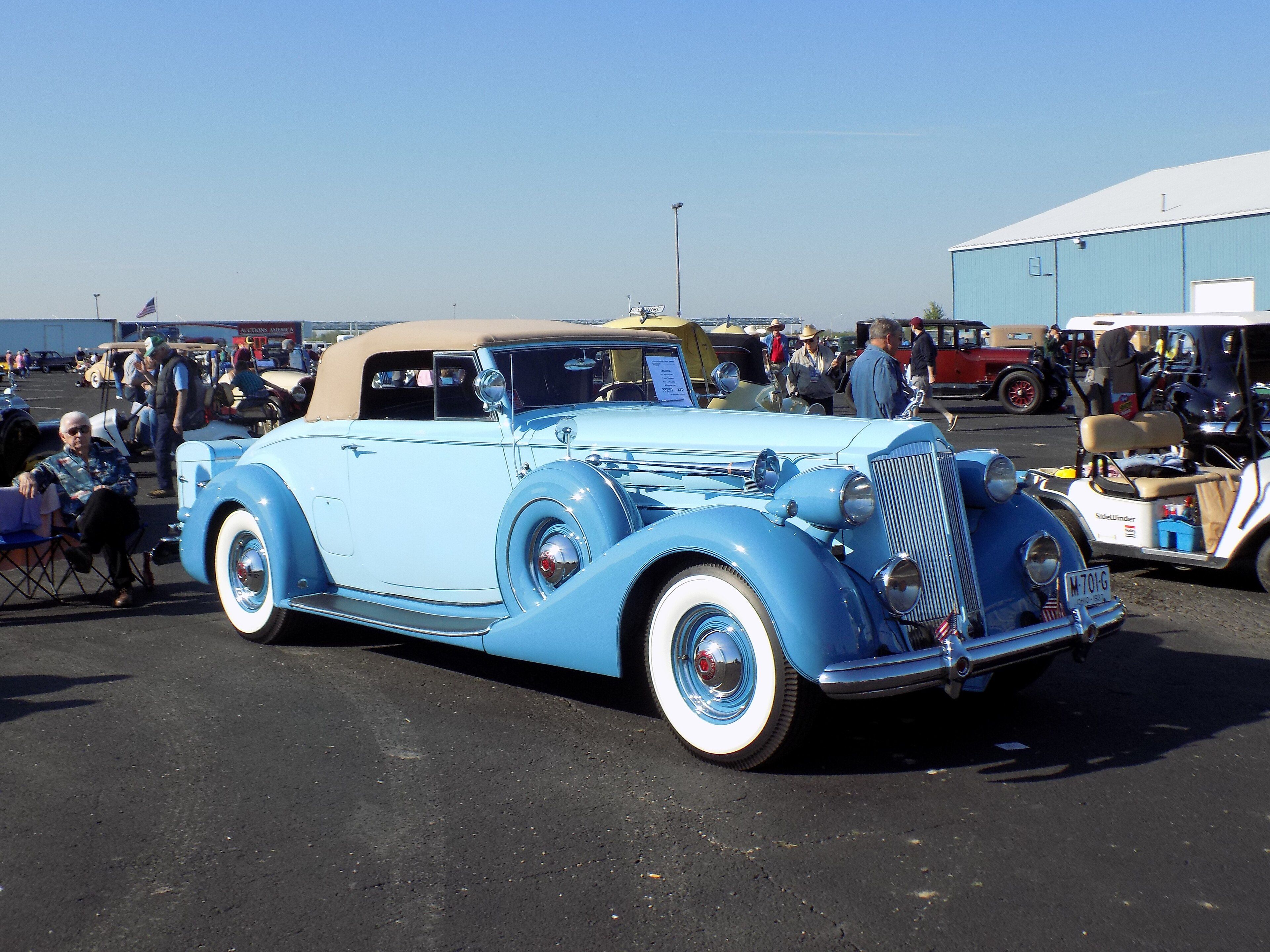 Light-blue 1937 Packard 1507 Twelve Roadster, front three-quarter view