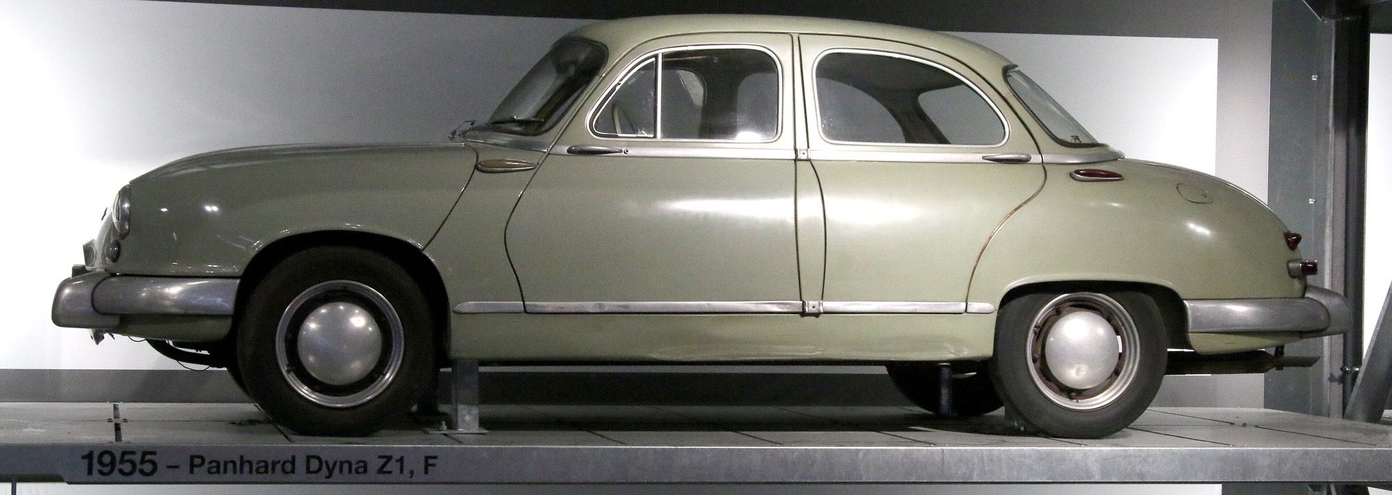 Pale green 1955 Panhard Dyna Z1 four-door saloon on museum display, side profile