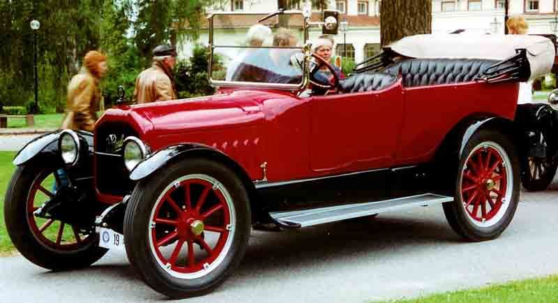 1917 Peerless Model 56 seven-passenger touring car in red, front three-quarter view