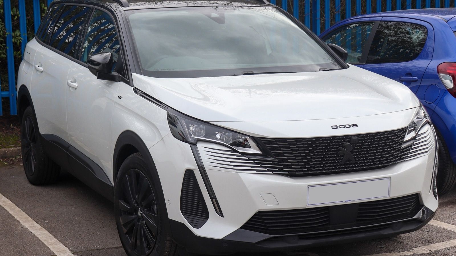 White facelifted 2020 Peugeot 5008 GT Premium SUV, front three-quarter view