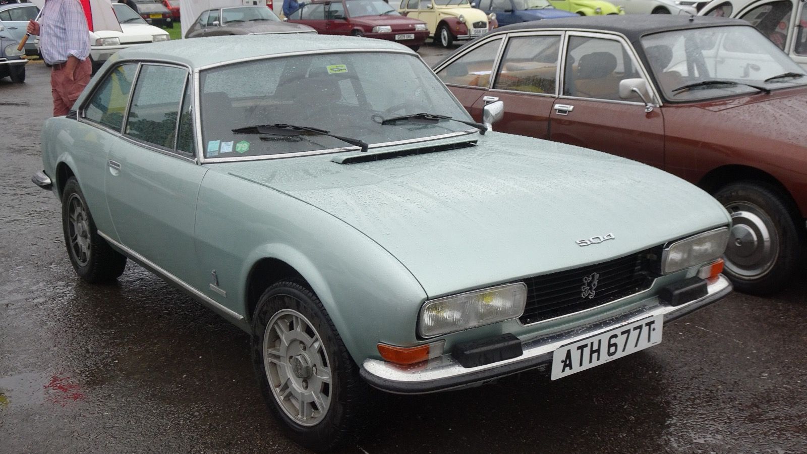 Light green 1979 Peugeot 504 Coupé at the National Motor Museum, Beaulieu, front three-quarter view