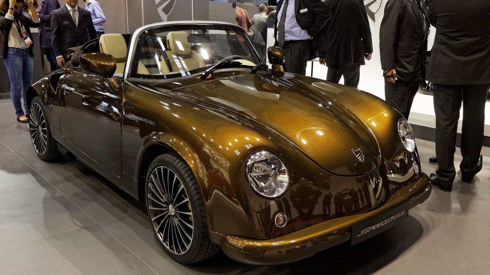 Bronze PGO Speedster II on the PGO stand at the 2012 Paris Motor Show, front three-quarter view