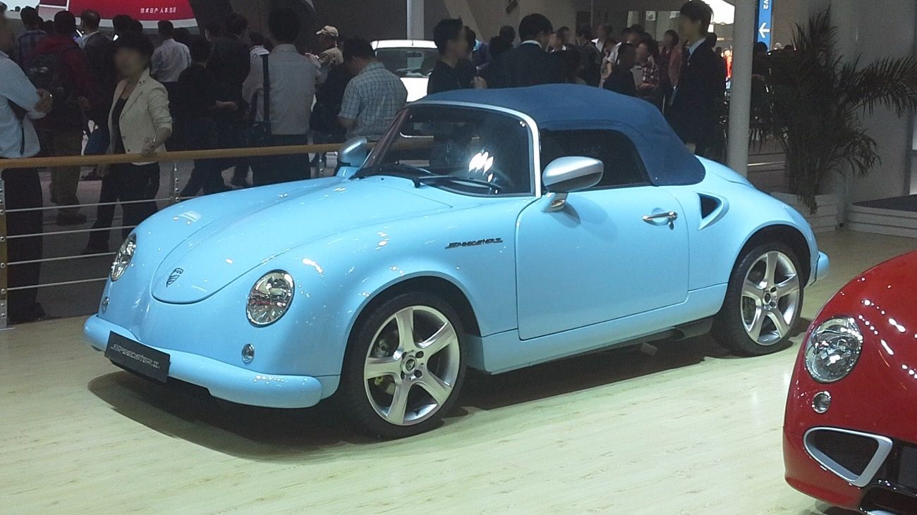 Light-blue PGO Speedster II with blue soft top at Auto China 2014, front three-quarter view