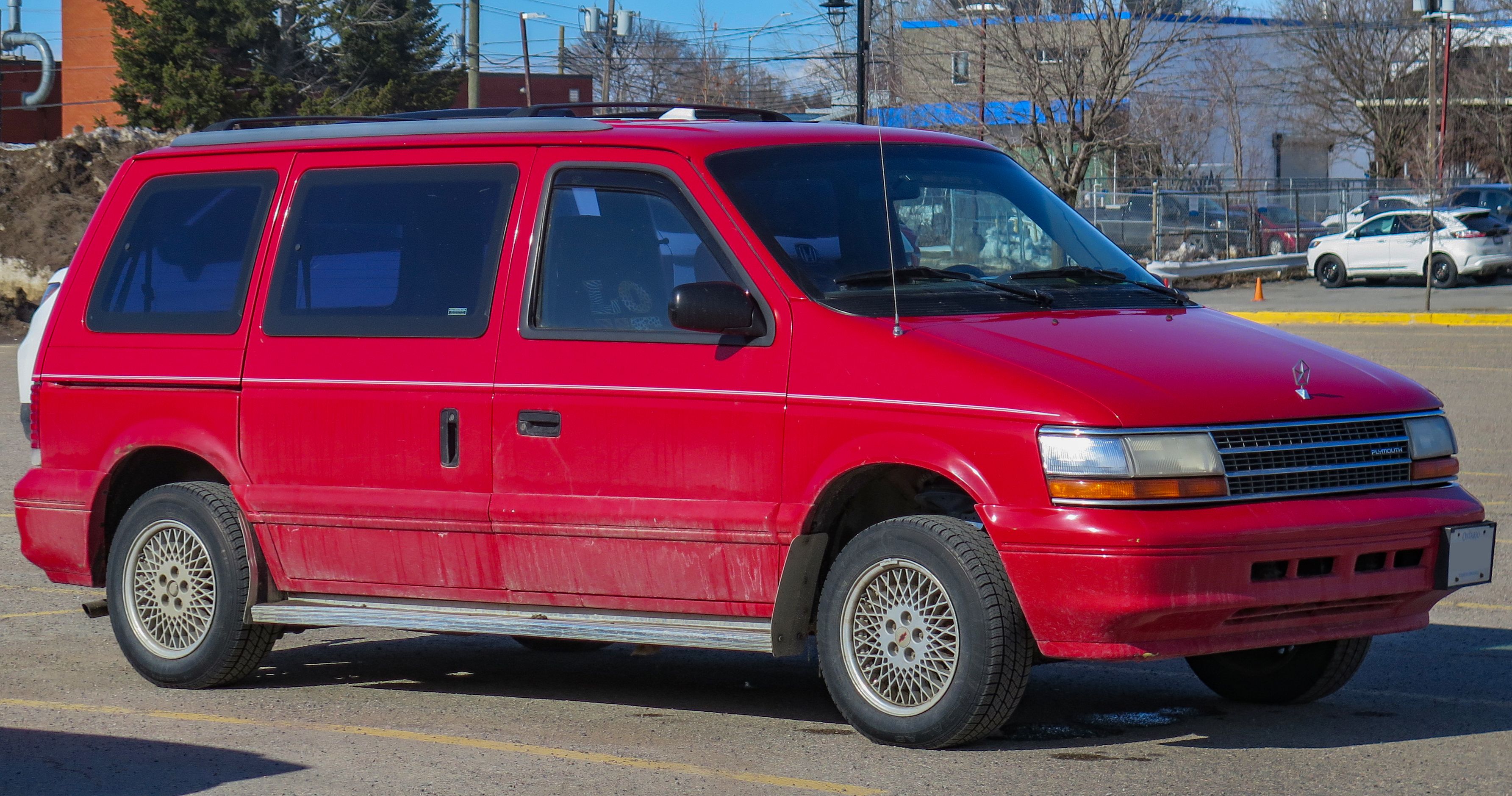 1995 Plymouth Voyager SE in red, front three-quarter view