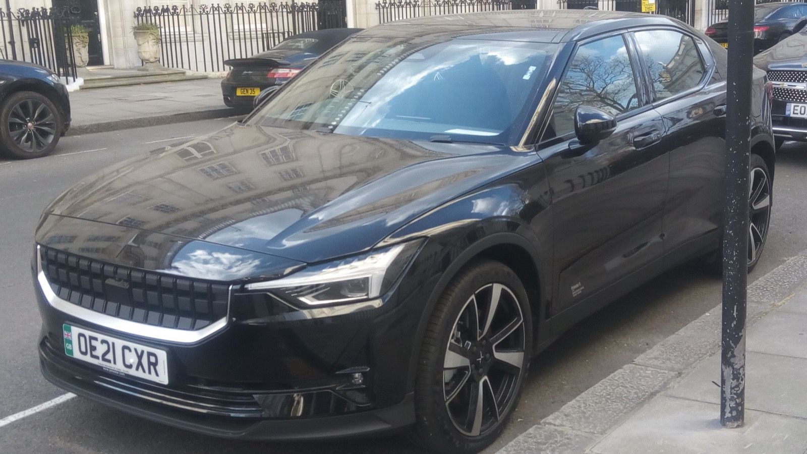 Black 2021 Polestar 2 Pilot Plus AWD parked on a London street, front three-quarter view