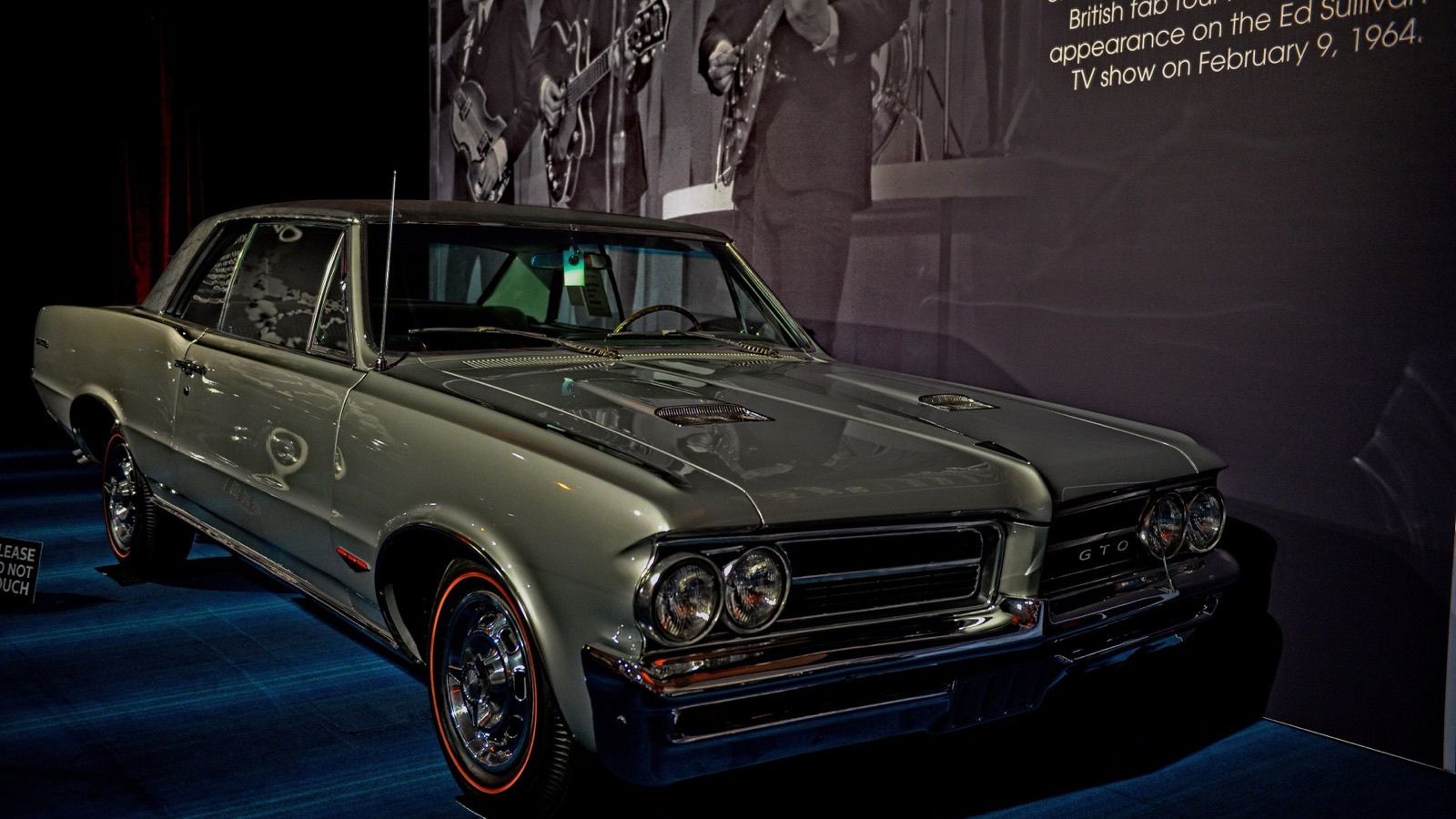 1964 Pontiac GTO coupe on museum display, front three-quarter view