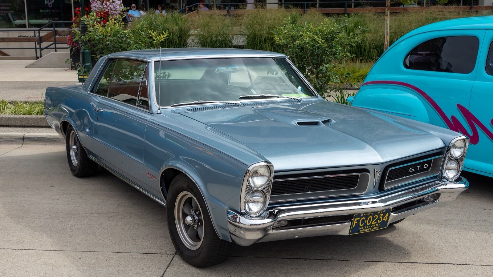 1965 Pontiac GTO hardtop in light blue, front three-quarter view