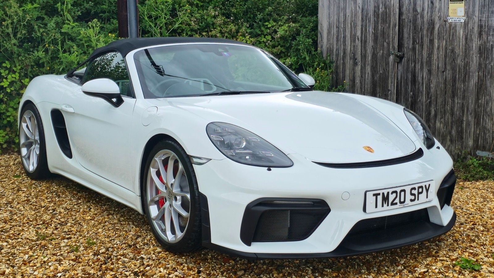 White 2020 Porsche 718 Spyder roadster, front three-quarter view
