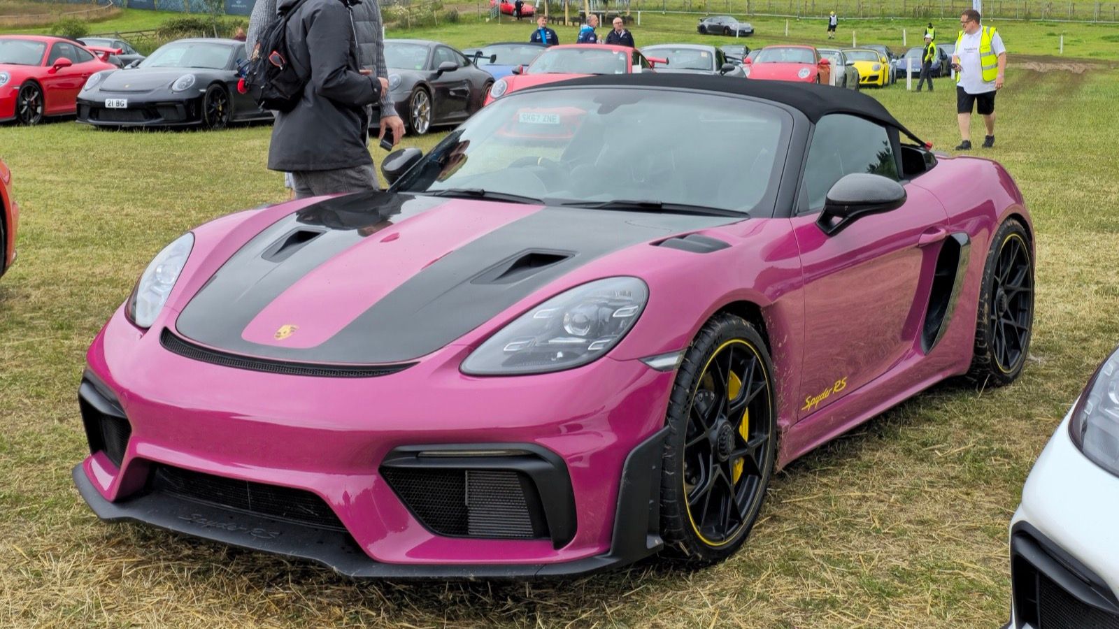 Purple 2024 Porsche 718 Spyder RS roadster, front three-quarter view