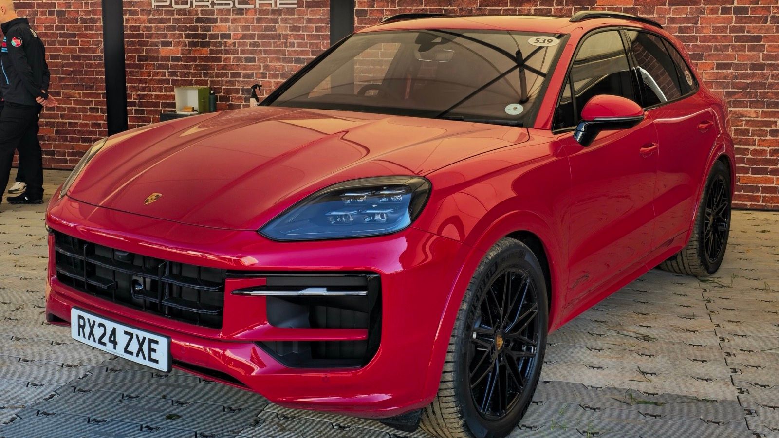 Red 2024 Porsche Cayenne GTS SUV, front three-quarter view