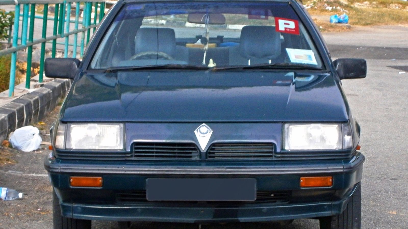 Dark green 1992 Proton Saga Megavalve Aeroback 1.5S, front view