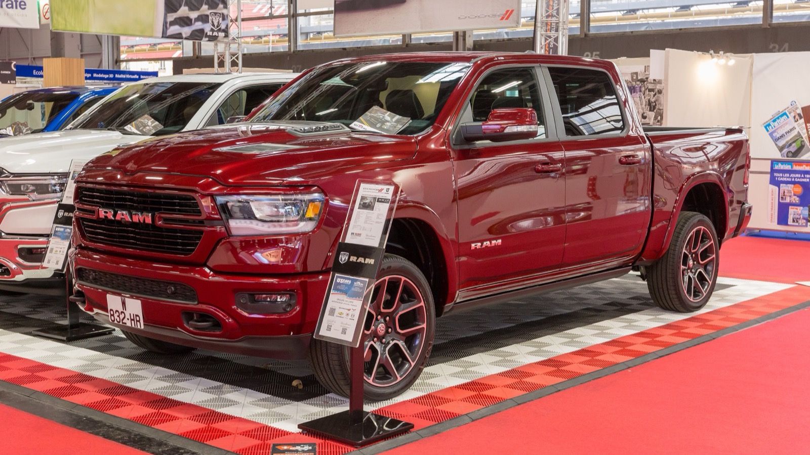 Dark red 2019 Ram 1500 Crew Cab Laramie Sport on display at the 2018 Paris Motor Show, front three-quarter view