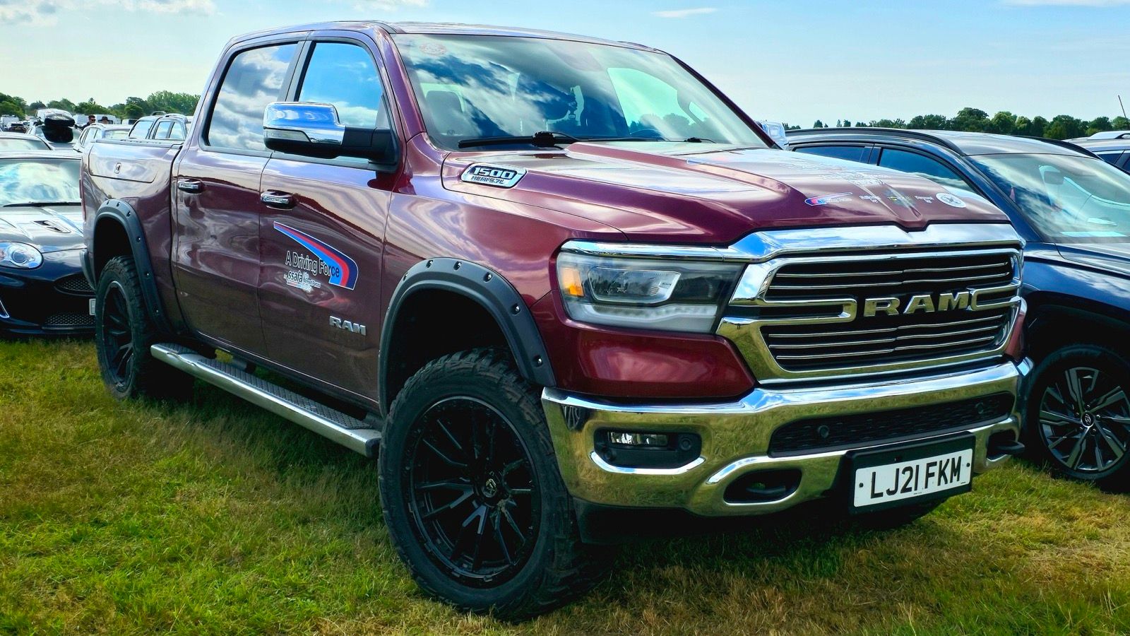 Maroon 2021 Ram 1500 crew cab with the 5.7-litre Hemi V8, front three-quarter view