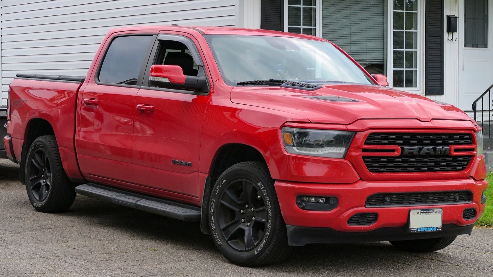 Red 2022 Ram 1500 Sport GT crew cab, front three-quarter view