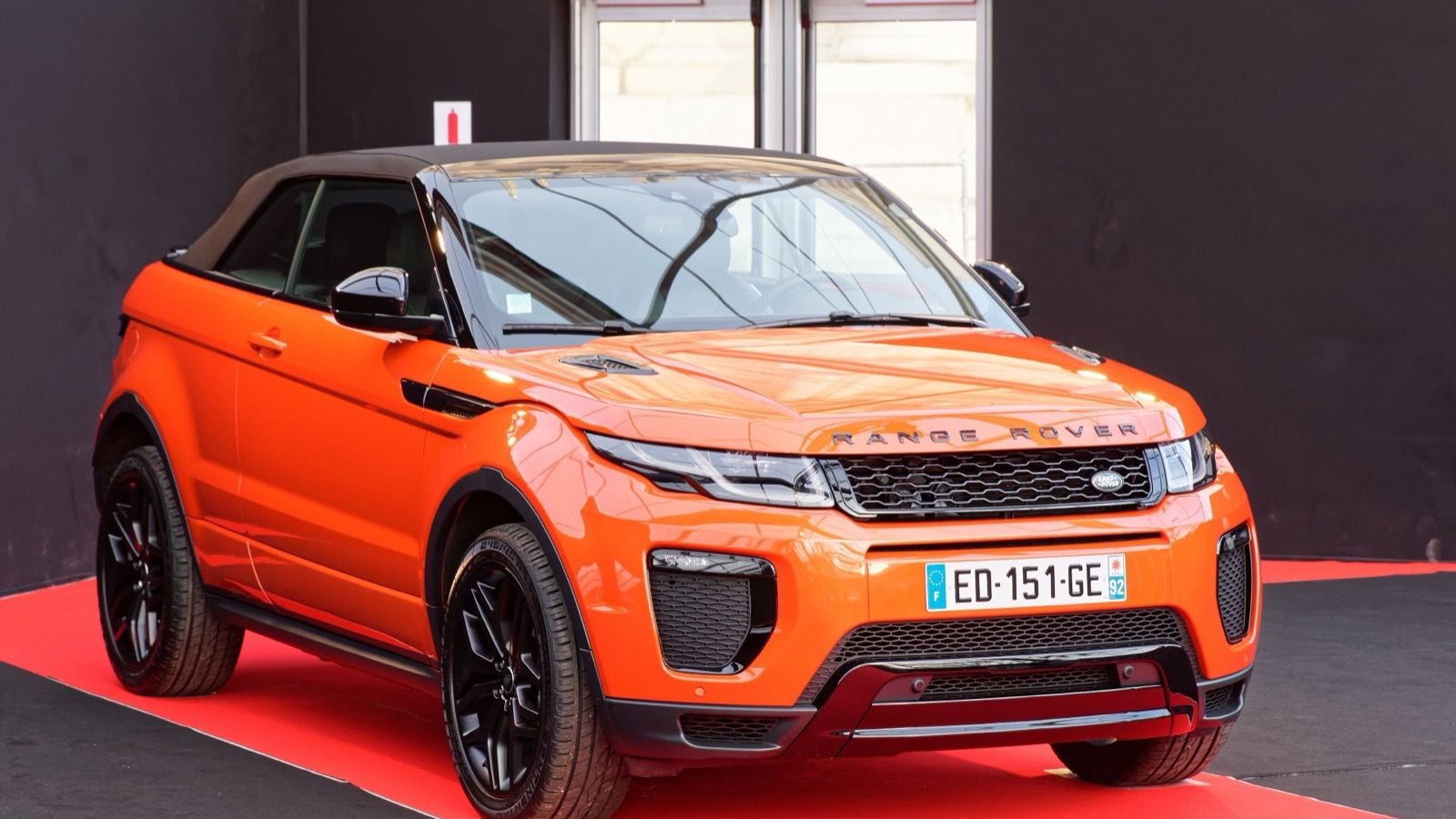 Orange 2017 Range Rover Evoque Convertible (L538) on display, front three-quarter view
