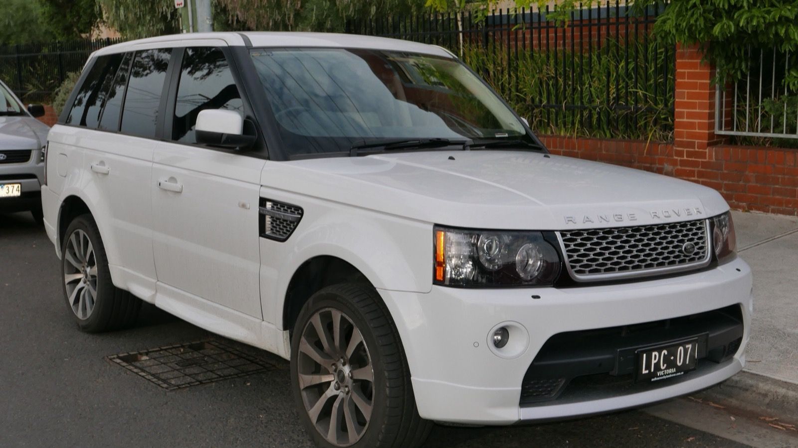 White 2011 Range Rover Sport Supercharged Autobiography (L320), front three-quarter view