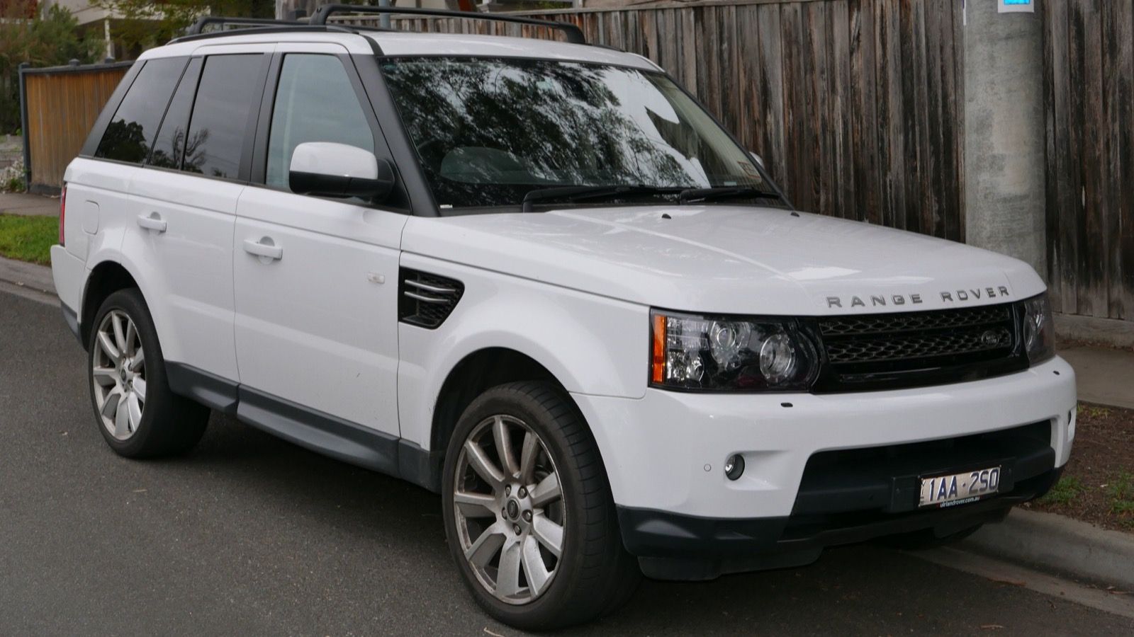 White 2013 Range Rover Sport SDV6 (L320) at a kerb, front three-quarter view