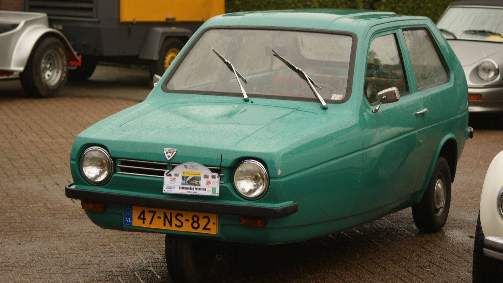 Green 1977 Reliant Robin 850 three-wheeler, front three-quarter view
