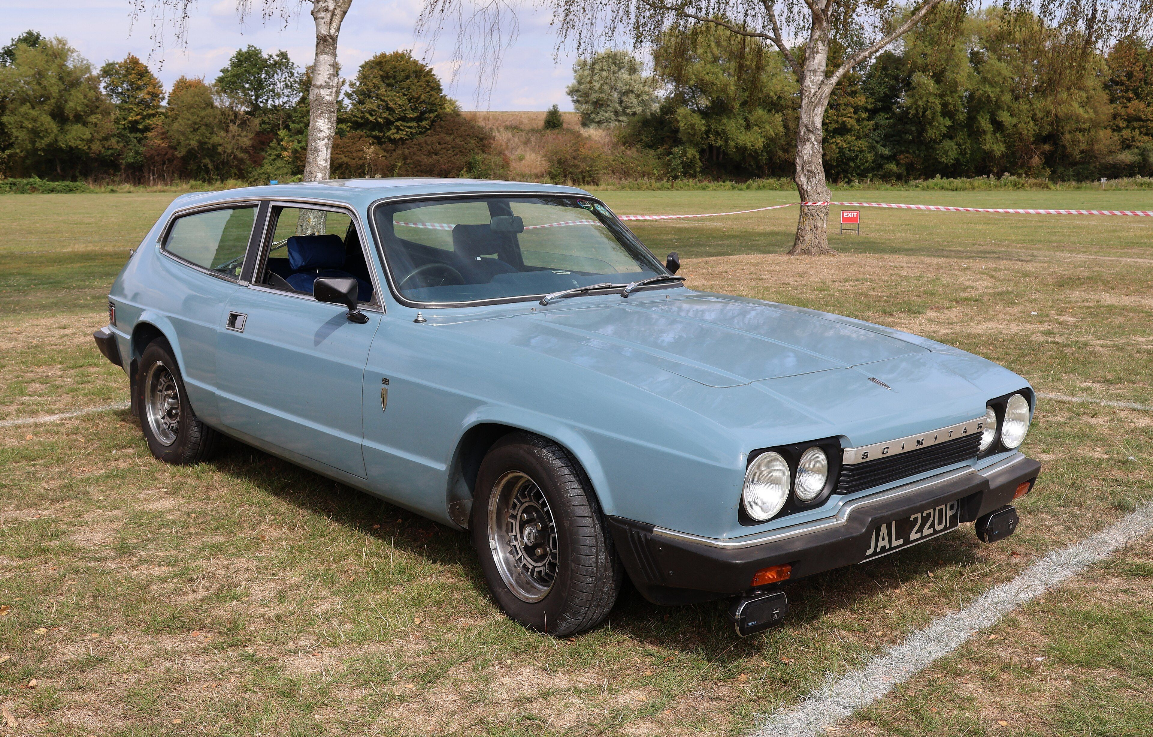Light blue 1976 Reliant Scimitar GTE SE6 sporting estate, front three-quarter view