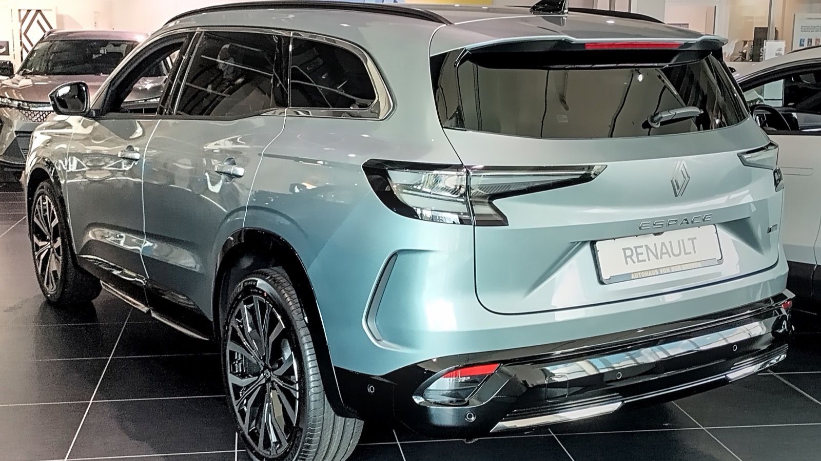 White 2025 sixth-generation Renault Espace crossover SUV, side three-quarter view