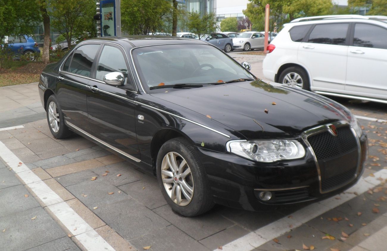 Black facelifted Roewe 750 sedan parked at a kerbside in China, front three-quarter view