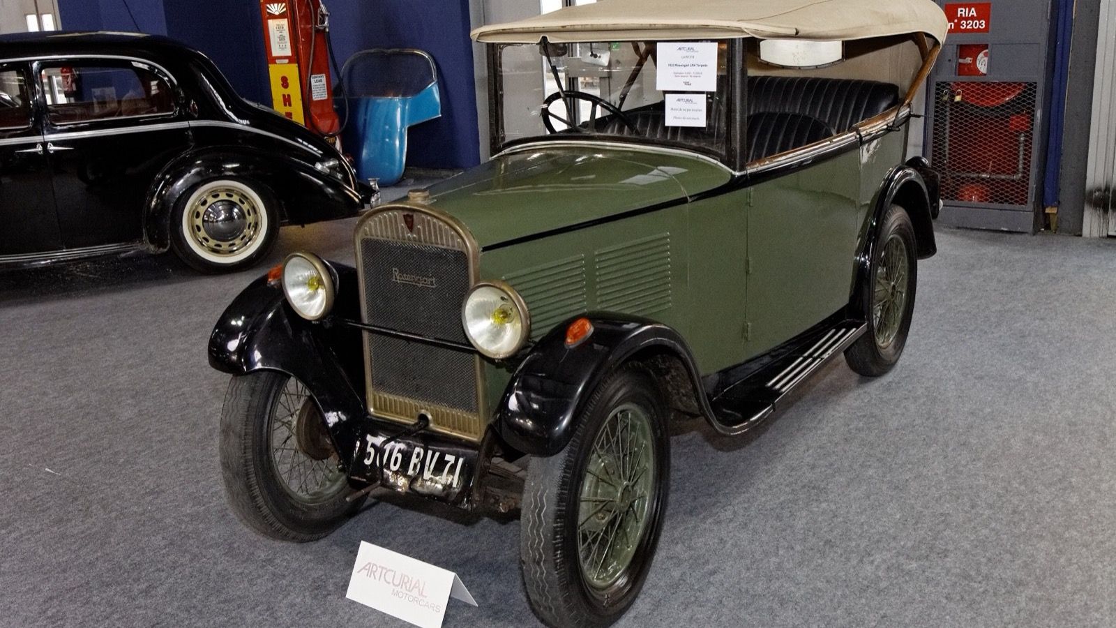 Green and black 1933 Rosengart LR4 Torpedo with folding top raised, front three-quarter view
