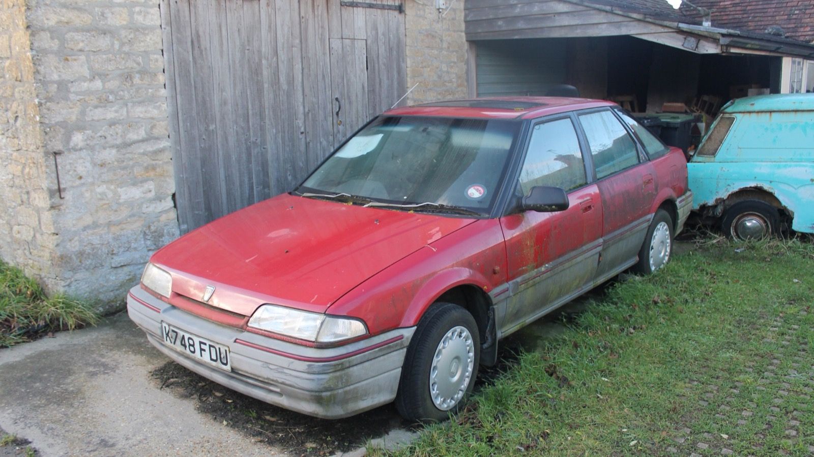 Silver 1993 Rover 214 SLi (R8) hatchback, front three-quarter view
