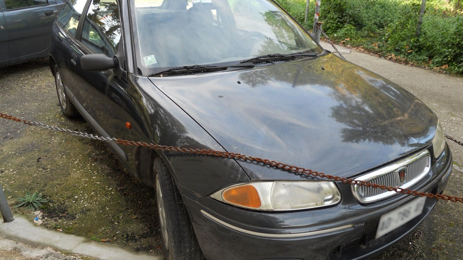 Blue 1996 Rover 214 Si (R3) hatchback, front three-quarter view