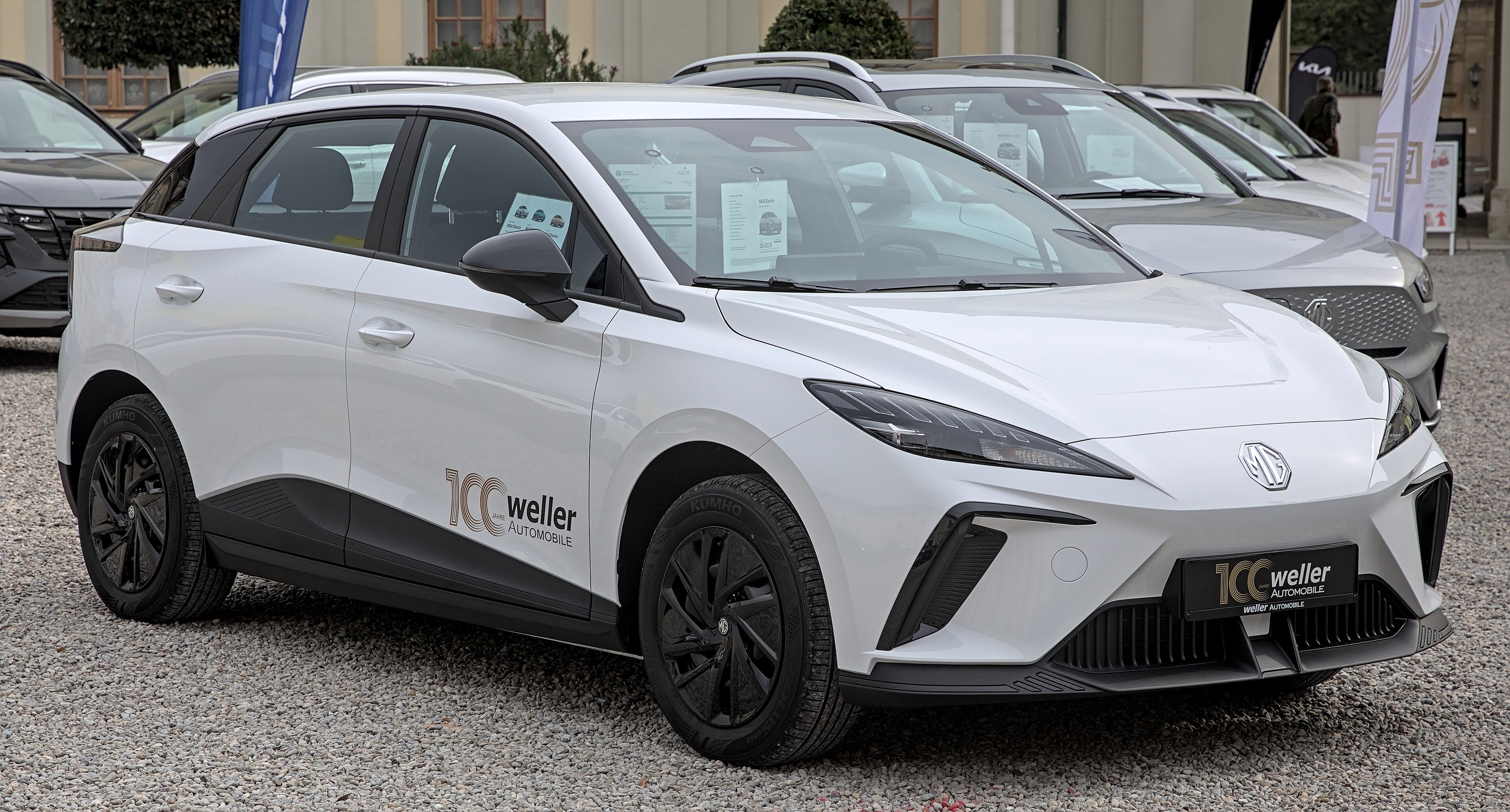 White 2022 MG4 EV electric hatchback, front three-quarter view