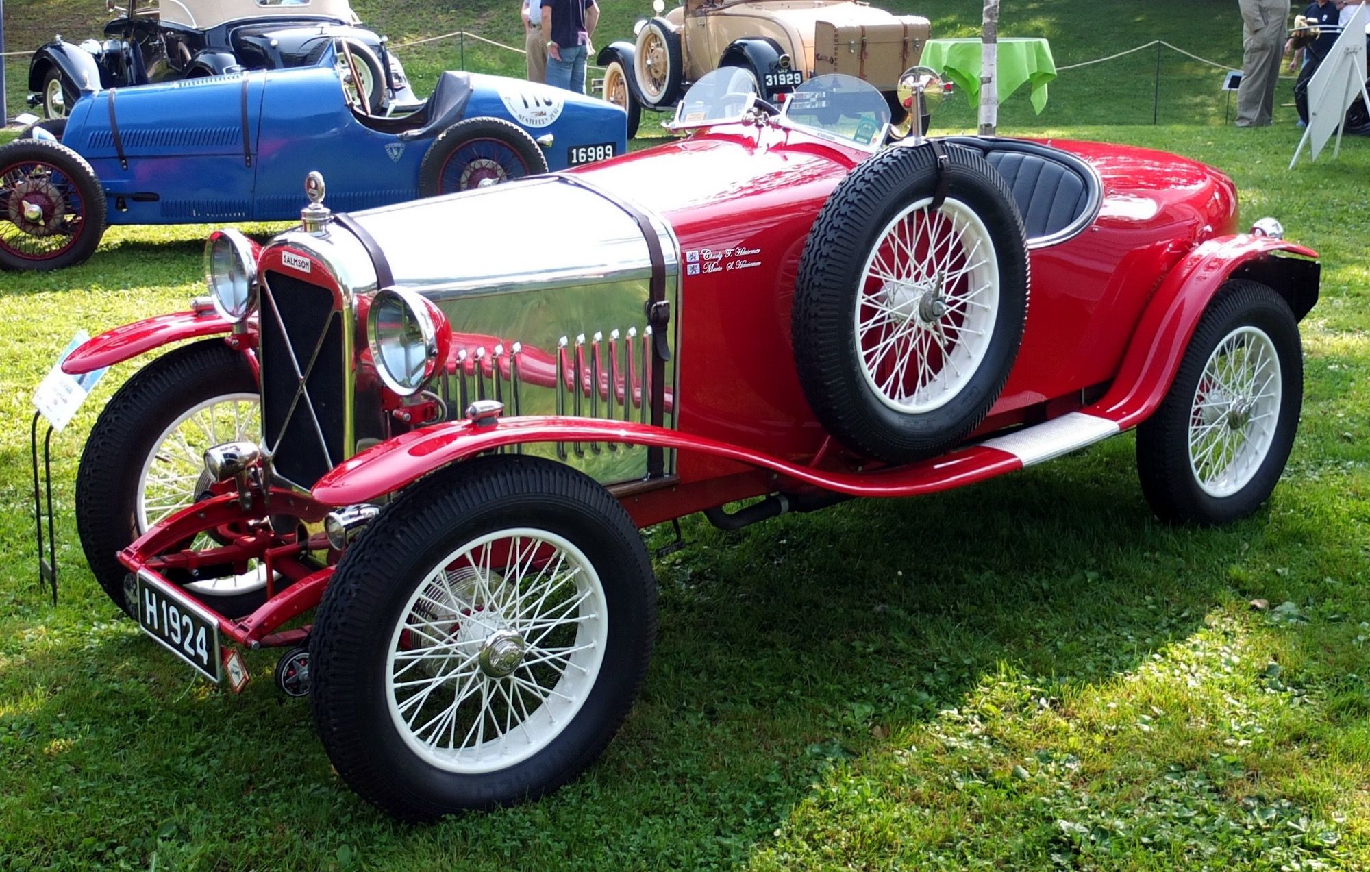 Red 1924 Salmson Grand Sport twin-cam roadster on grass, front three-quarter view