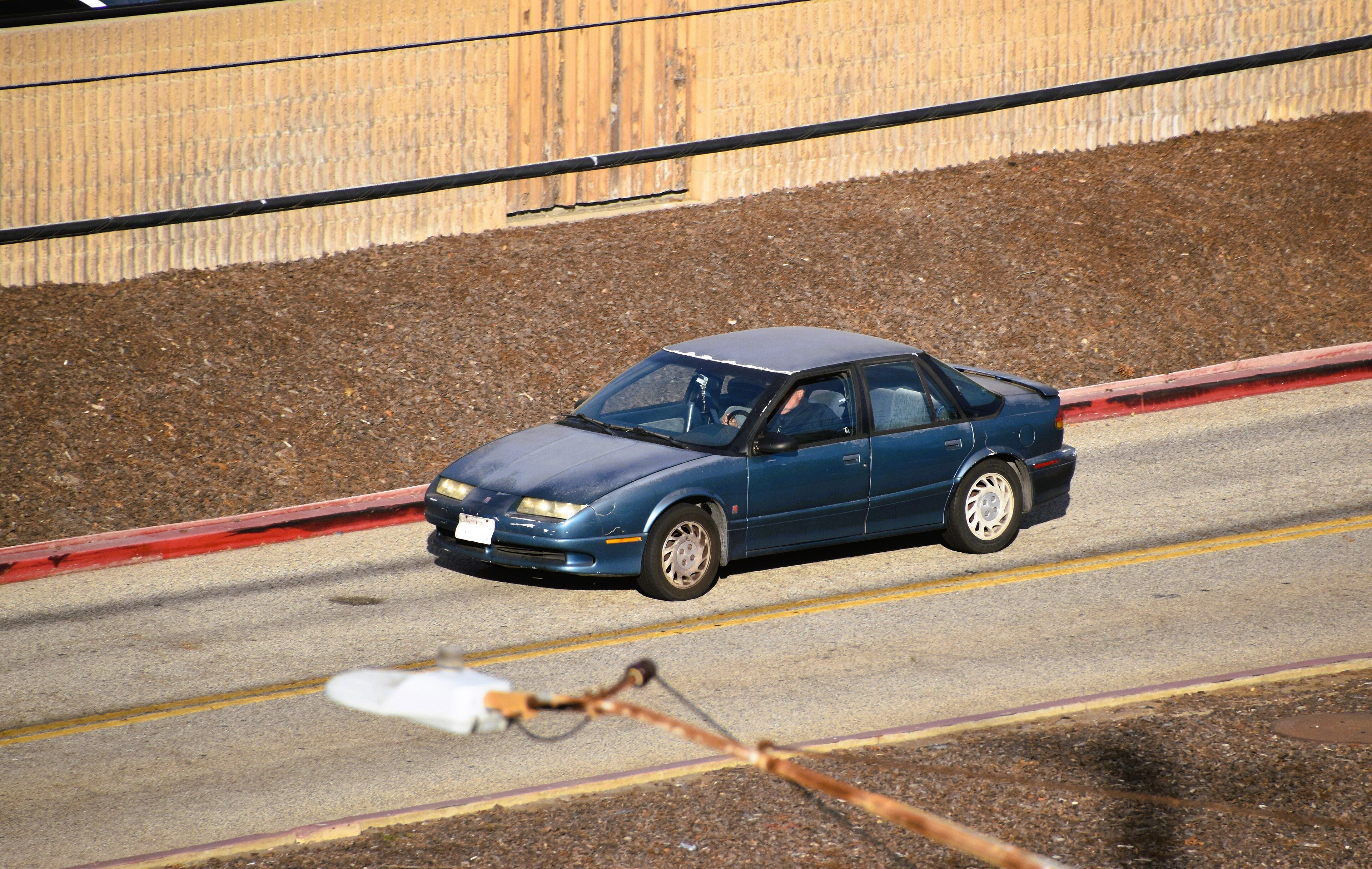 1991 Saturn SL2 sedan, front three-quarter view