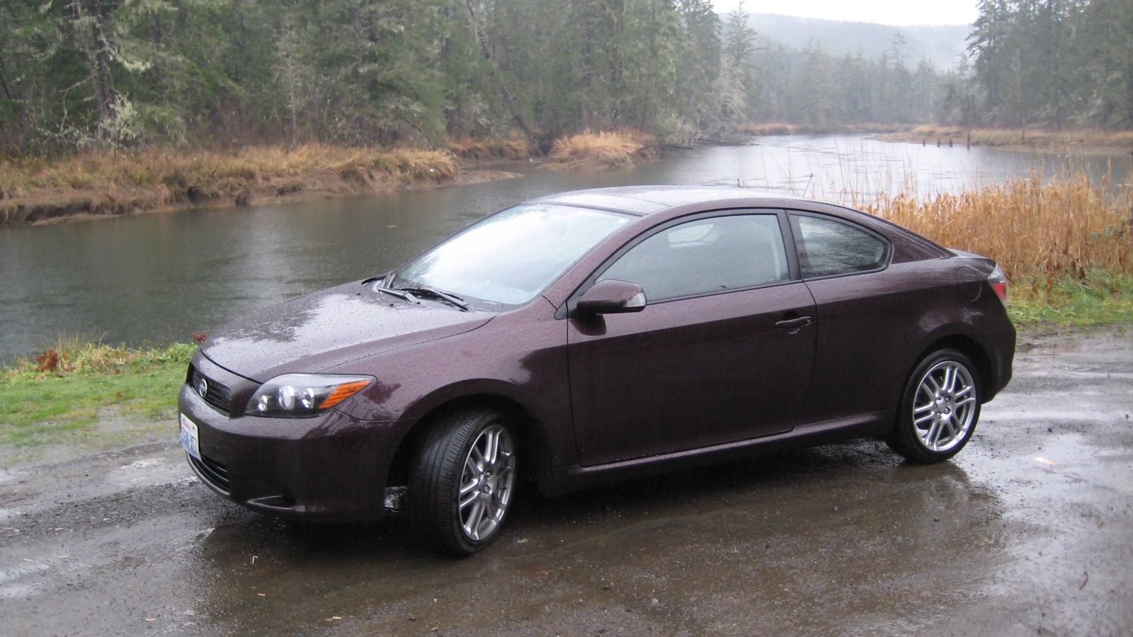 Dark maroon 2008 Scion tC coupe, front three-quarter view