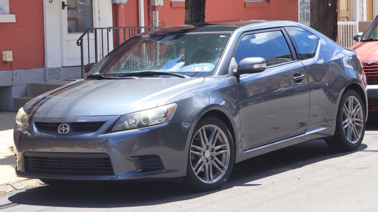 Gray 2013 Scion tC coupe, front three-quarter view