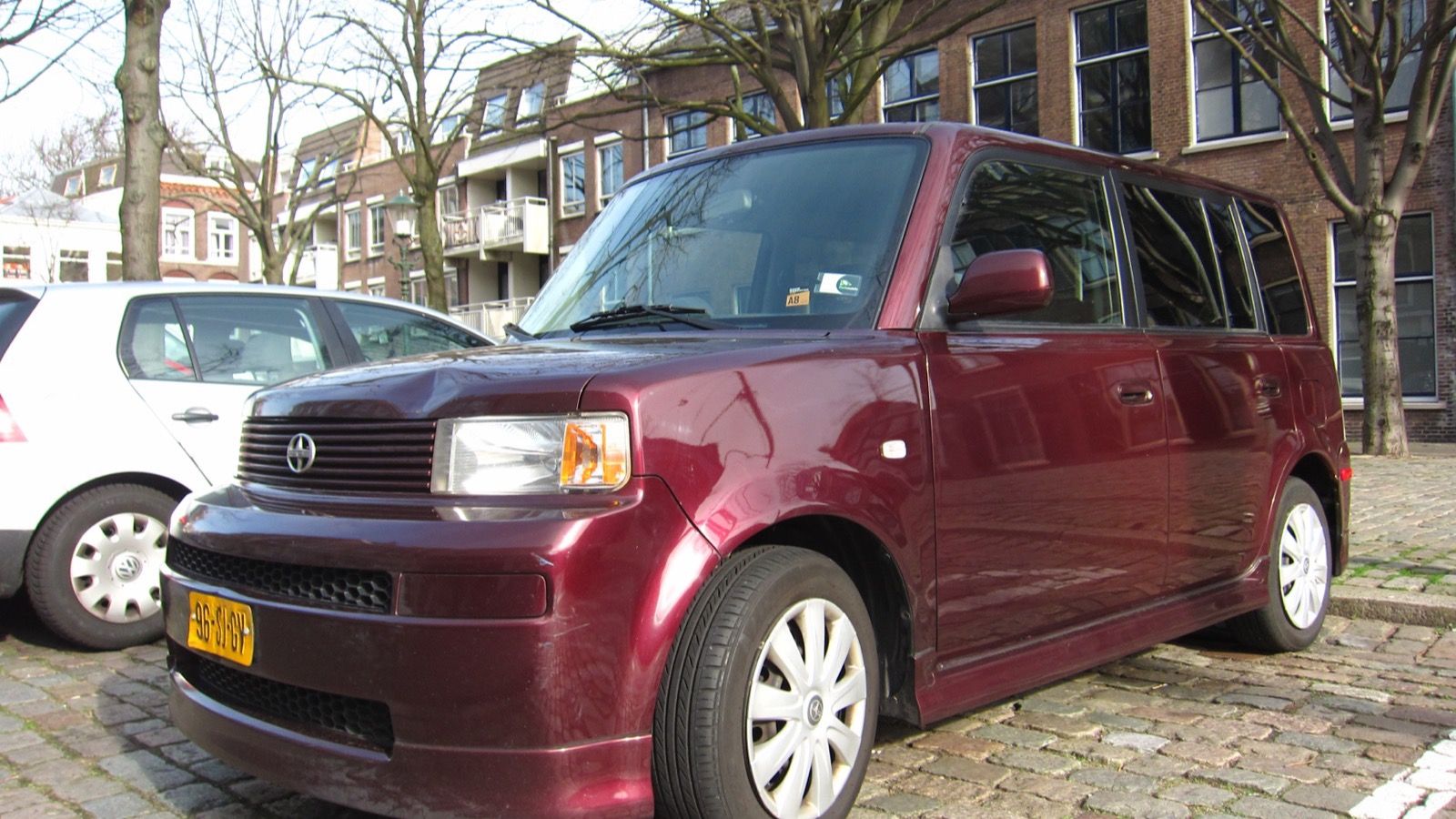 Dark red 2005 Scion xB, front three-quarter view