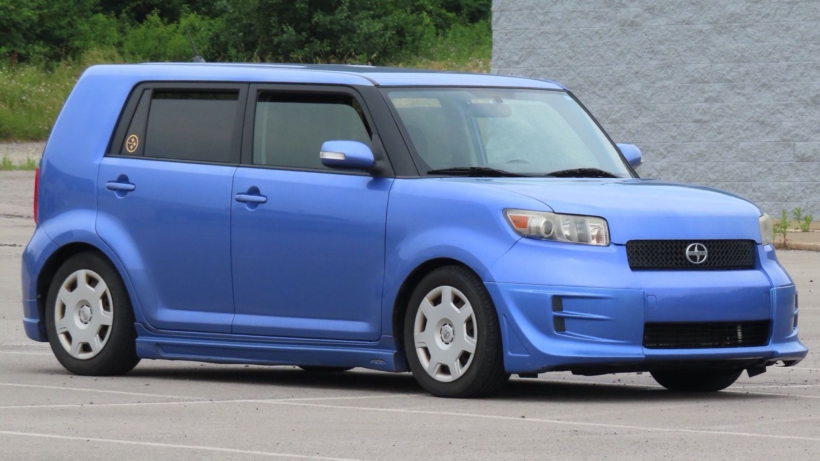 Blue 2010 Scion xB Release Series 7.0, front three-quarter view