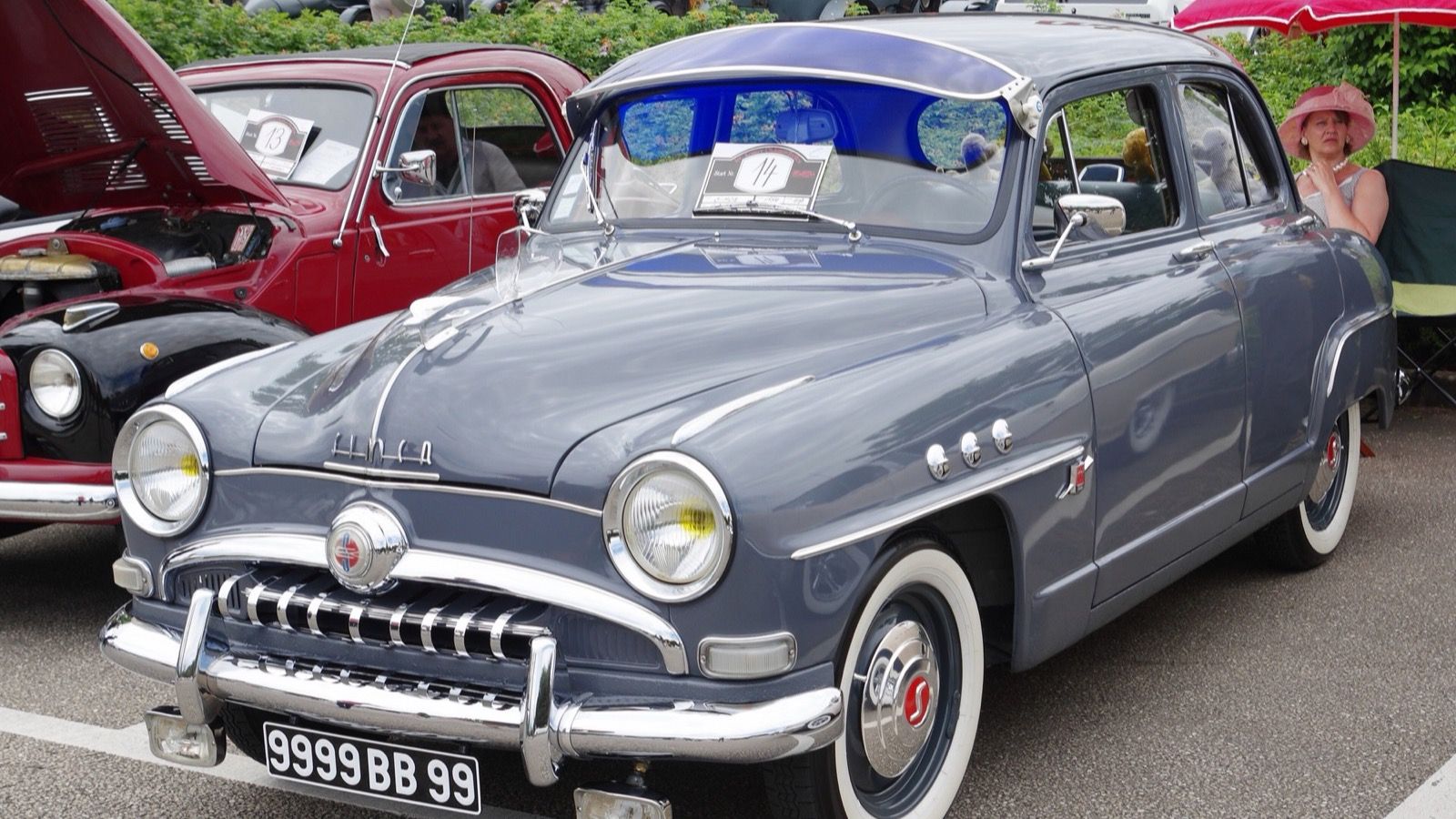 Simca 9 Aronde saloon in grey with dark roof, front three-quarter view