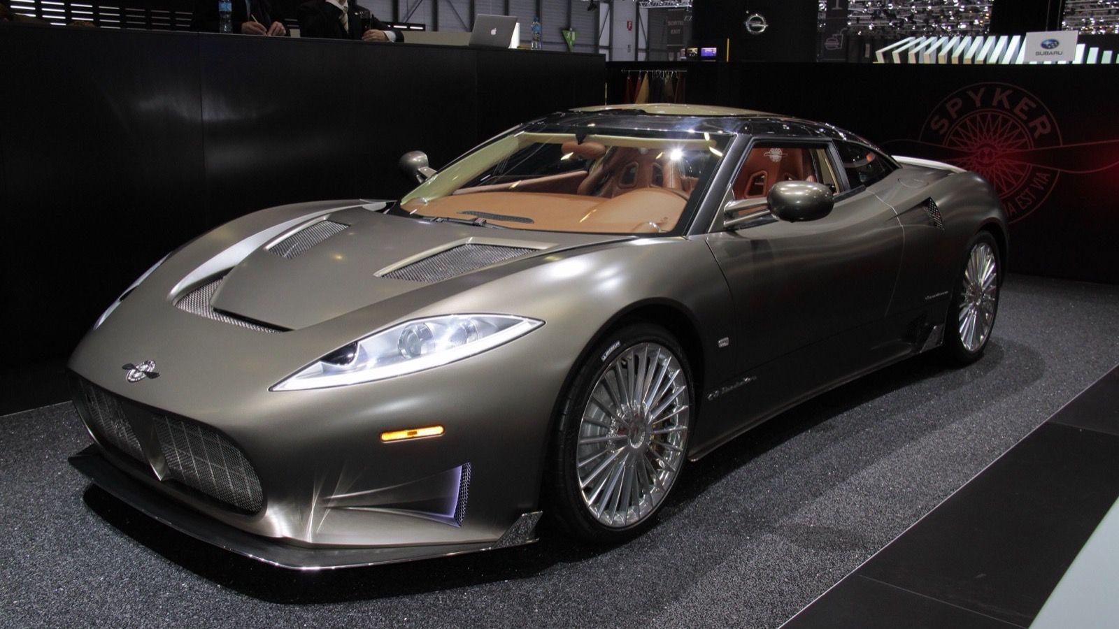 Matte-grey 2016 Spyker C8 Preliator at the Geneva Motor Show, front three-quarter view