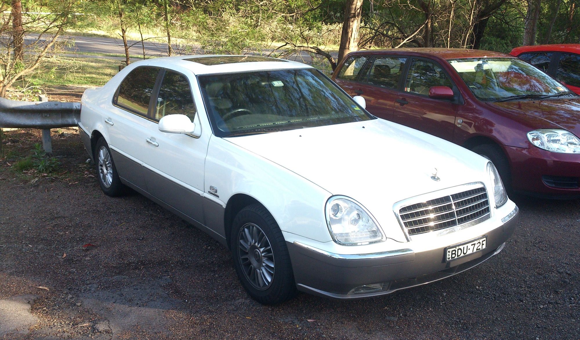 2008 SsangYong Chairman W sedan, front three-quarter view