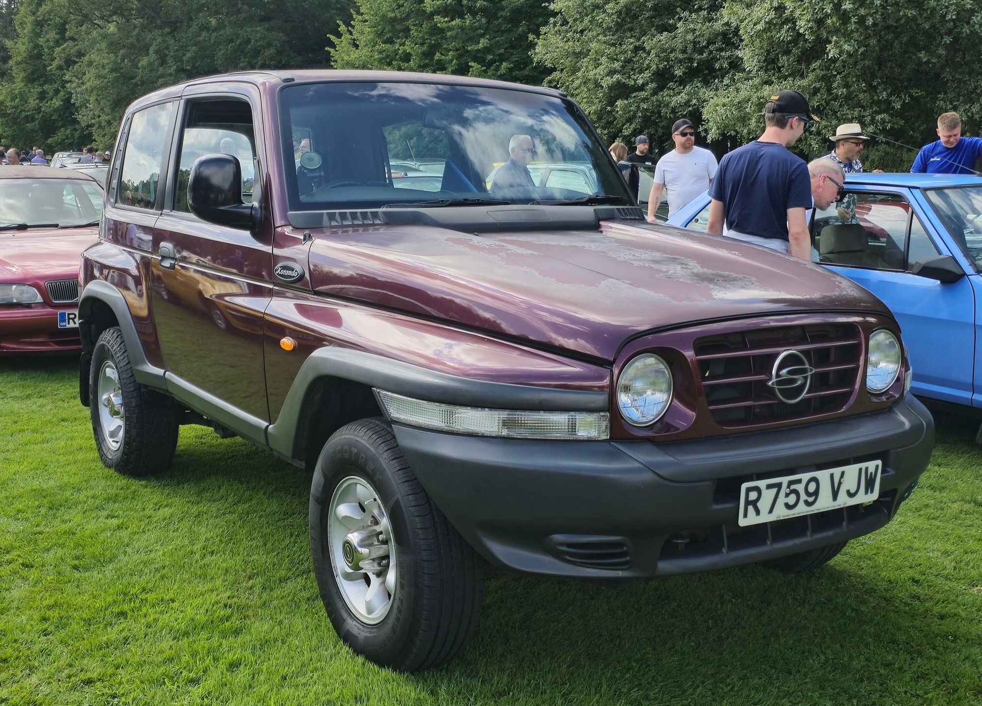 Green second-generation SsangYong Korando GLS, front three-quarter view