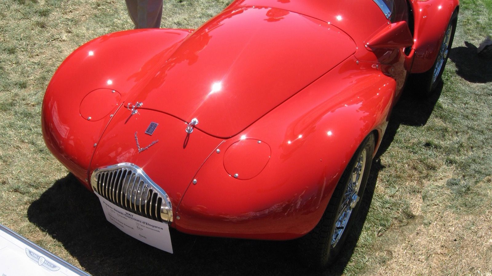 Red 1954 Stanguellini 750 Sport Internazionale barchetta, front three-quarter view