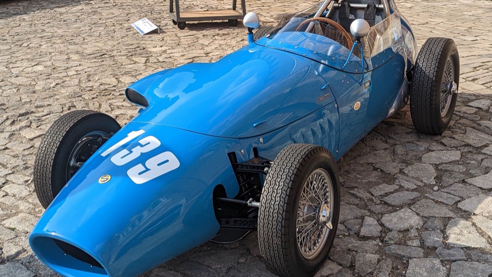 Blue 1959 Stanguellini Formula Junior single-seater, front three-quarter view