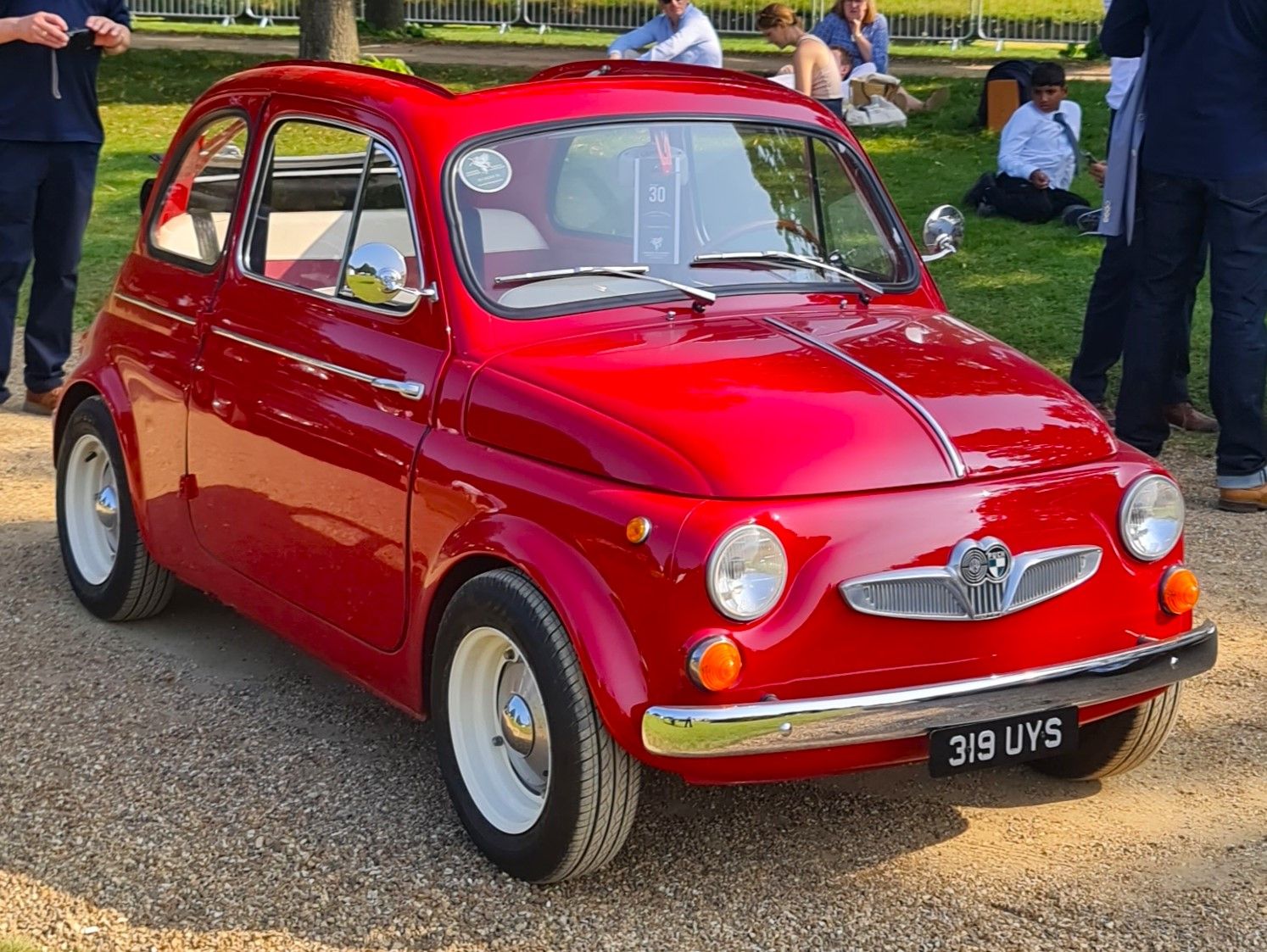Red 1962 Steyr-Puch 500 D two-door city car, front three-quarter view
